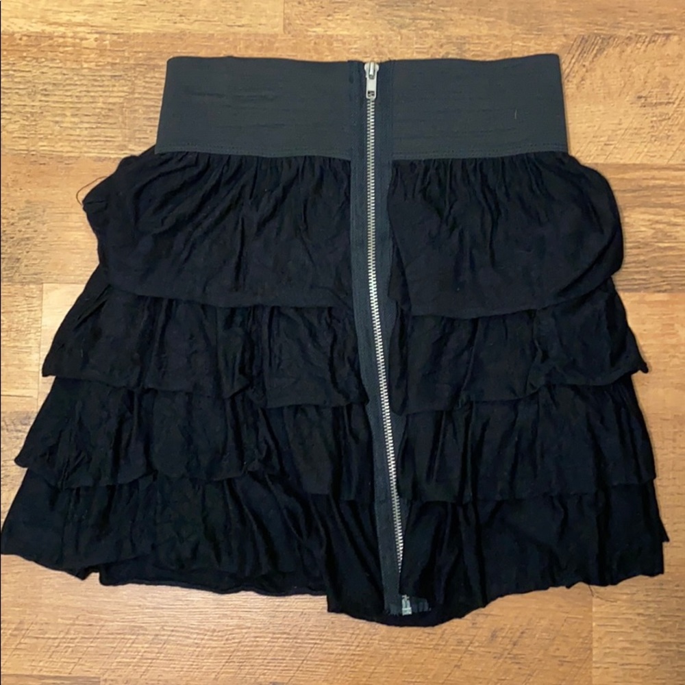 Black pleated mini skirt